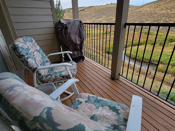 Balcony with grill and view of Swaner Nature Preserve