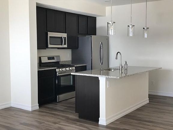 Island has steel plate instead of corbels so you don't wack your knees under there while eating your breakfast.