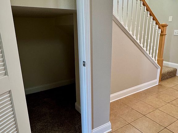 Extra storage under the stairs.