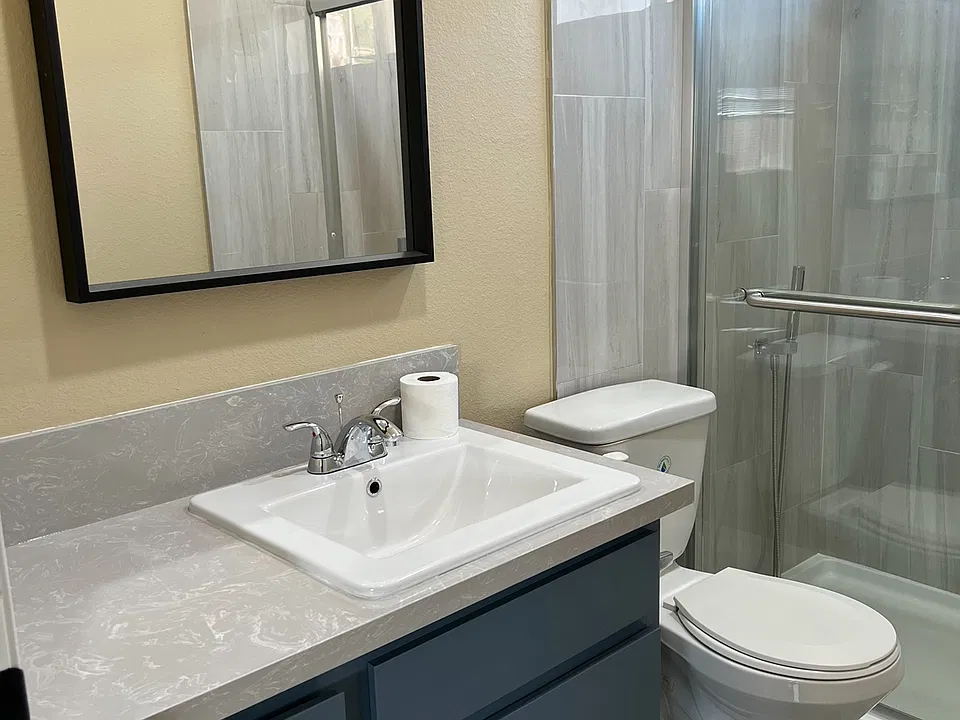 Brand new bathroom all tiles shower, new toilet, new countertop, and floor