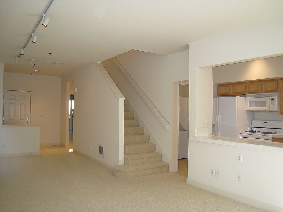 view of living room, stair to upstair, kitchen