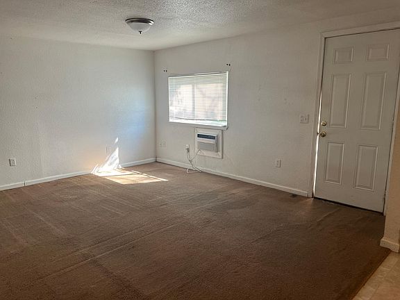 Front living room, but the carpet has been replaced... See other photos with stairs.