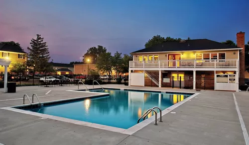 Outdoor pool with large sundeck - Willow Bend Apartments