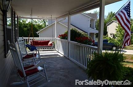 Covered front porch
						:
						Custom fit blinds for porch included.