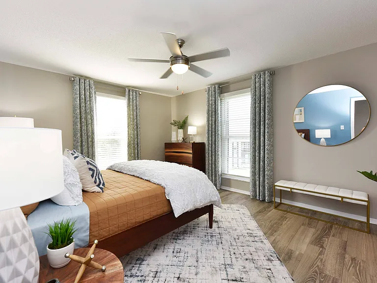 Bedroom with hardwood-style flooring