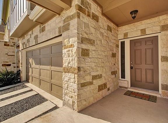 Roomy two car garage -with side by side parking. No tandem here! Nice covered entry.