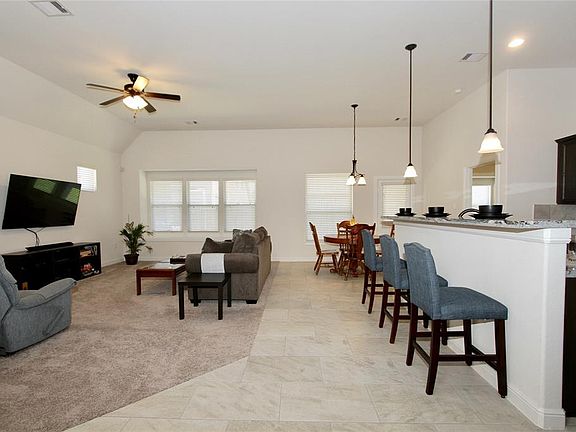 Now we're entering the vast Open Concept floor plan that flows so effortlessly.