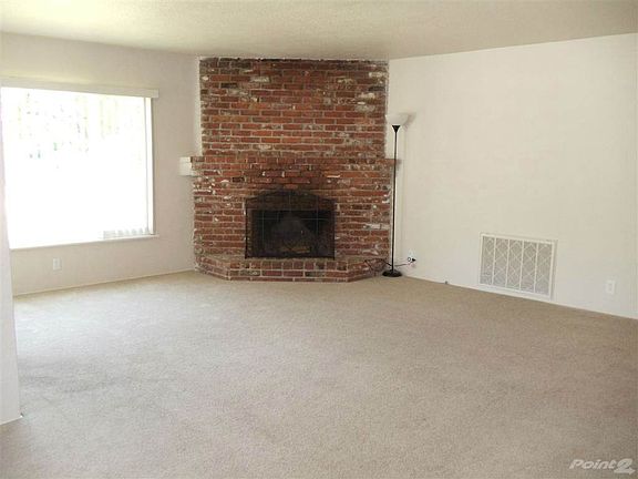 Spacious living room with cozy fireplace!