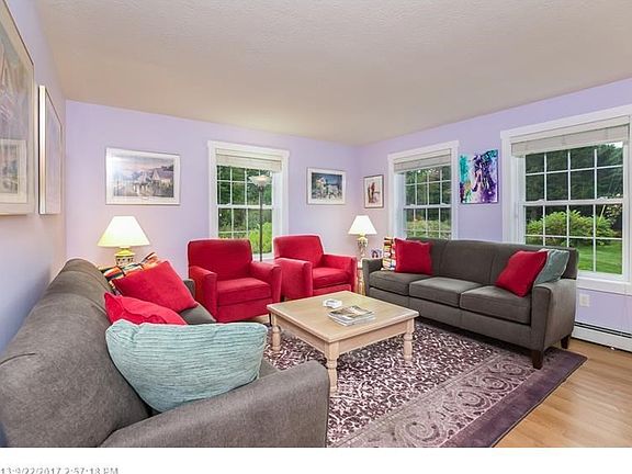 The living room windows provide a perfect view of the natural beauty of the property.