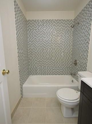 Glass tile shower enclosure