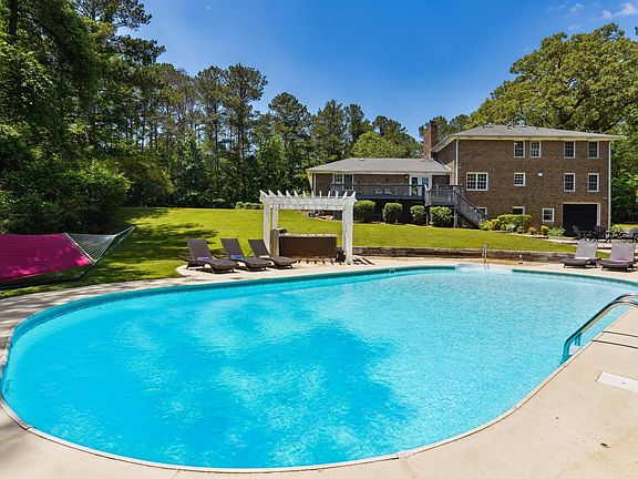Pool ONLY OPEN May - September, HotTub open ALL YEAR. (Lounge chairs, pool bathroom, pool kitchen sink only usable/open in summer pool season)