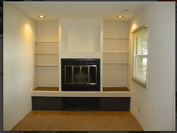 Wood Burning Fireplace with shelves