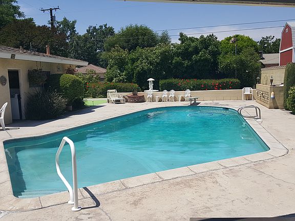 4th image of 9808 Kempster Ave