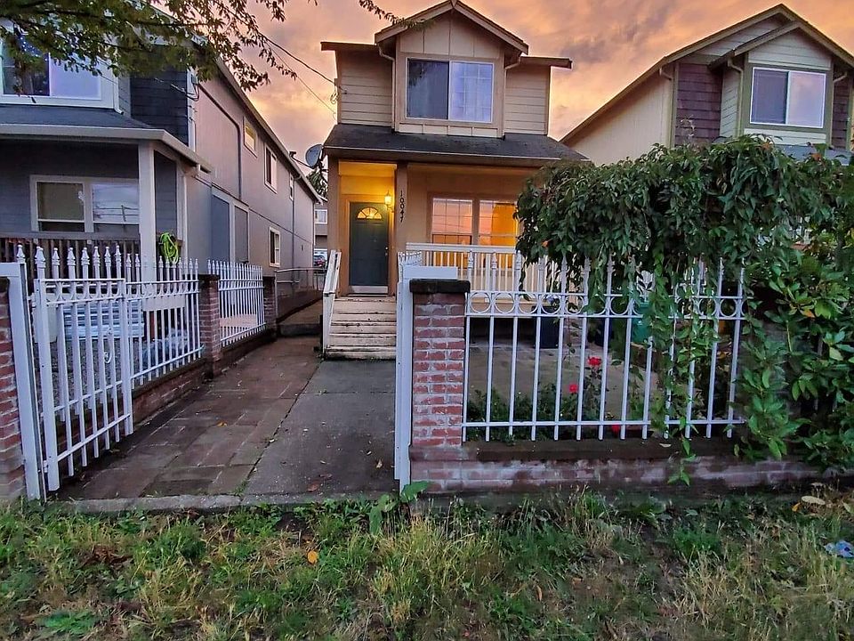Front of house, gated and fenced with garden space. 2 cars can park in front
