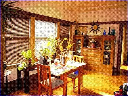 Dining with built ins and hardwood floors