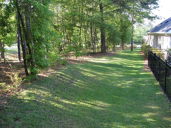 Another view of the long, private side yard.