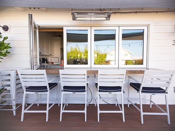 Ocean view BBQ, indoor/outdoor eating area off of kitchen.