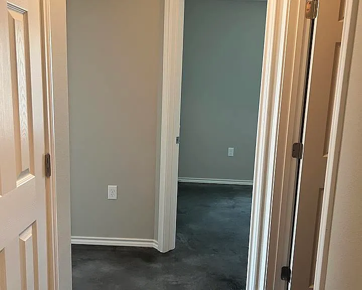 Hall view of additional bedrooms