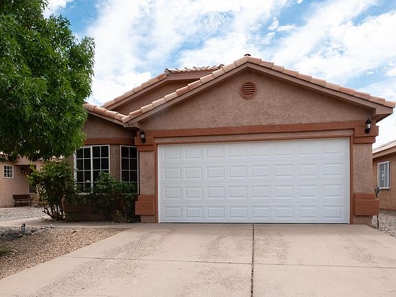 Don't let the outside fool you. Front door is on the left side of the house. House is very comfortable and open. Master bedroom on one side of house and the other two bedroom are very private from each other. A must see!