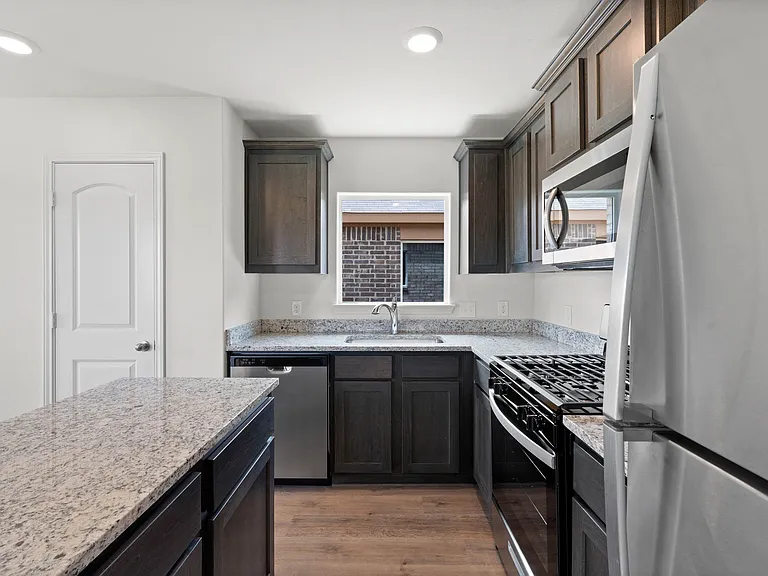 The kitchen has energy efficient appliances.