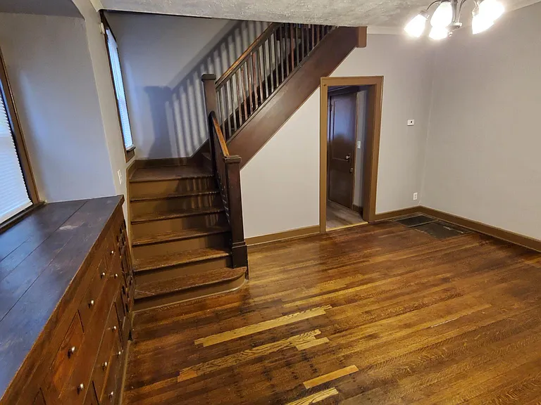 dining room w/built ins and stairs