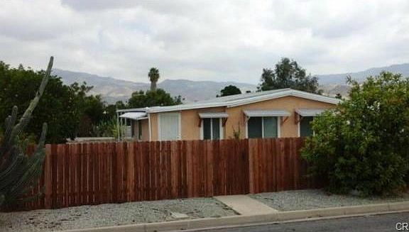 TALL WOODEN FENCE ALLOWS FOR PRIVACY