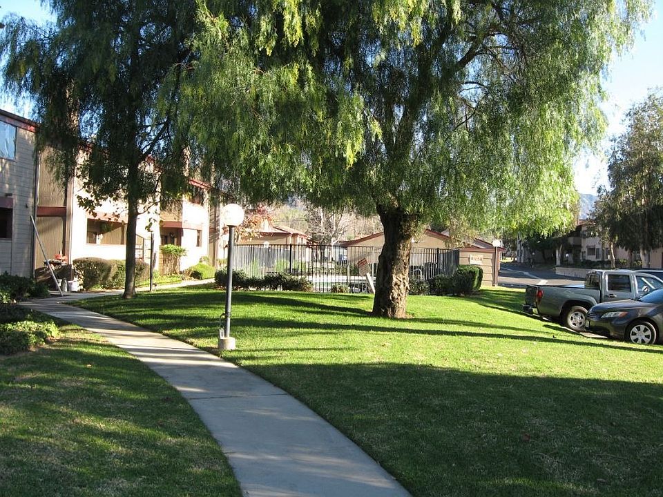 Large open spaces in complex giving it a park like atmosphere.