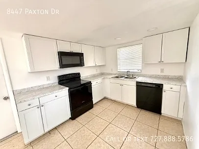 8447 Paxton Dr — Photo 49