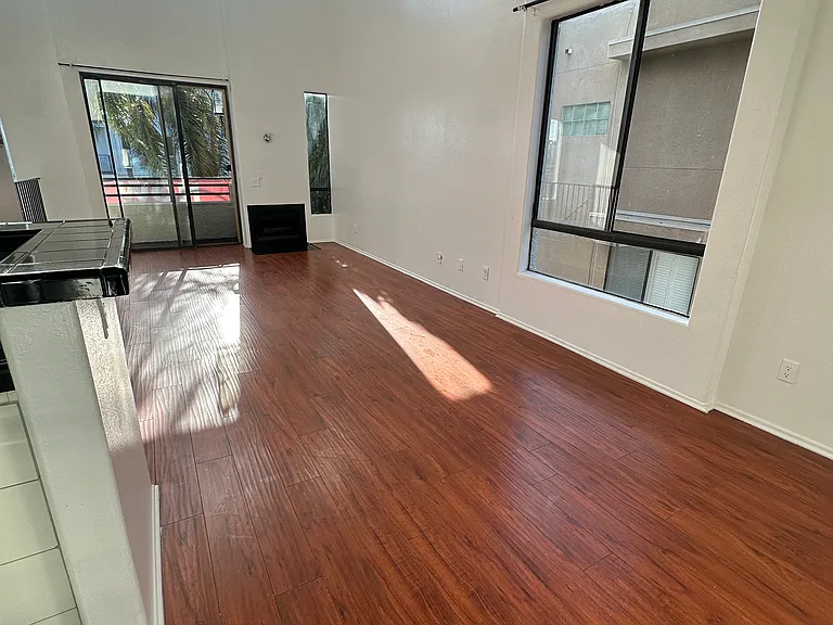 living room area with balcony access