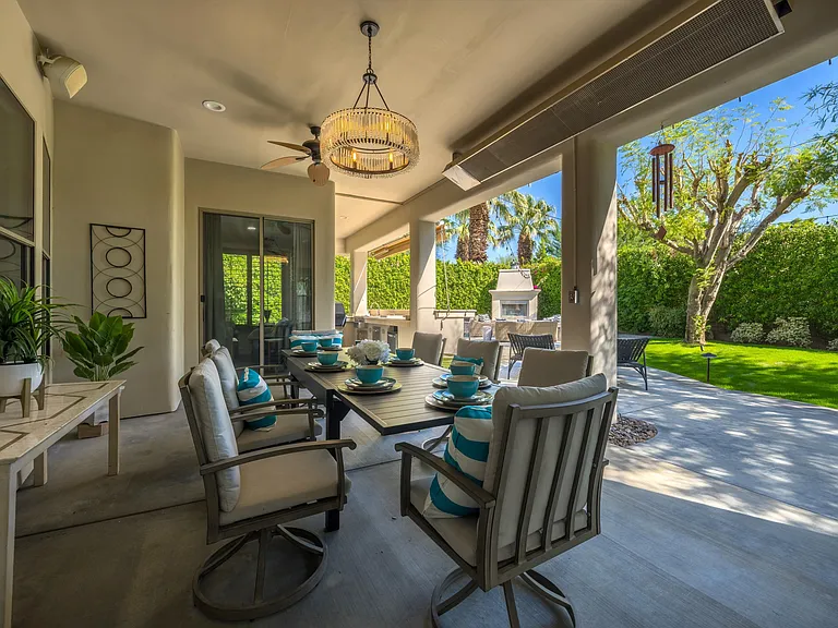 Al fresco dining for 8 with a heater and misting system