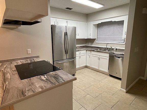 Updated kitchen with stainless appliances