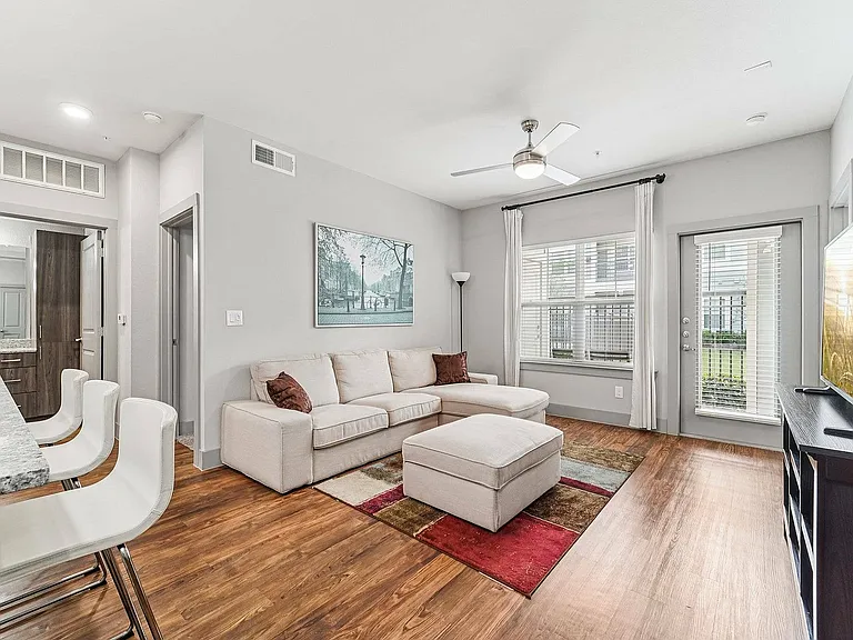 The Broadway features sleek and comfortable living rooms designed for modern city living.