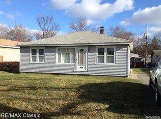 1406 Nightingale Rd, Wixom, MI 48393