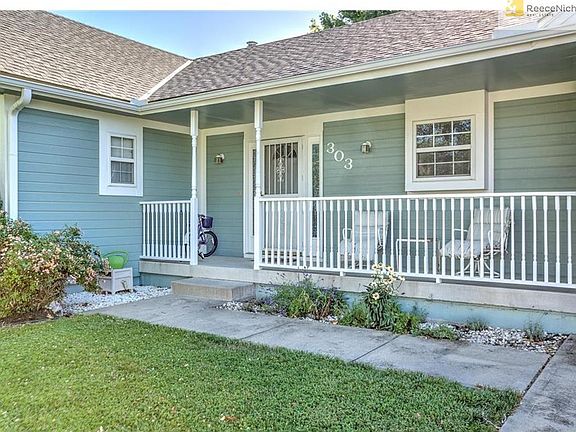 Front porch is shaded and ready for YOU!