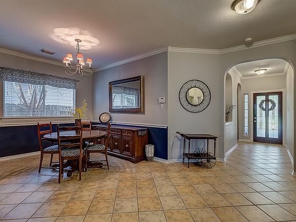 Open formal dining room awaits those family dinners with friends and family