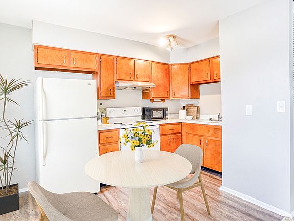 Welcome to Teays Valley Property Management, where modern design meets functionality. This charming kitchen features sleek cabinetry and ample space for dining. Embrace comfort and convenience in your next home. Schedule a tour today!