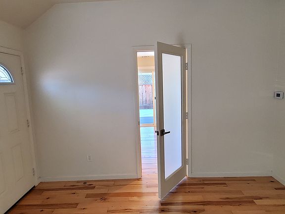 Main entry and door to the bedroom