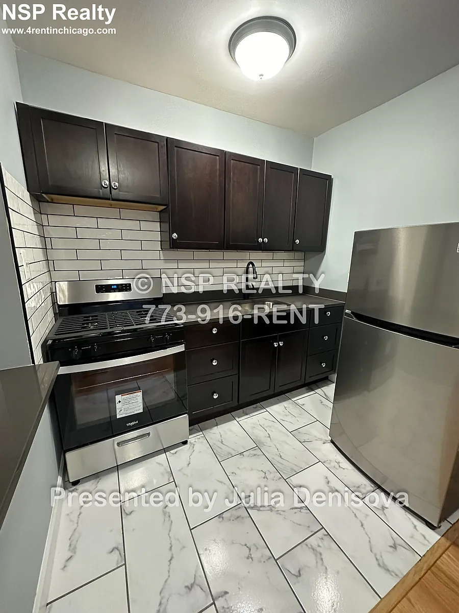 Building Photo - 5662 N Ridge Ave #1E
