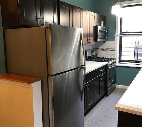 Kitchen w/ Stainless steel appliances
