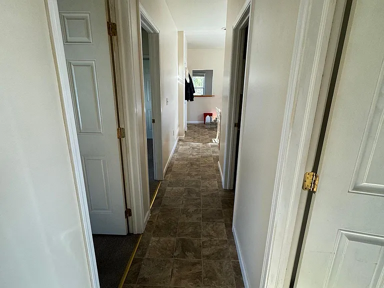 Hallway from entering in back door