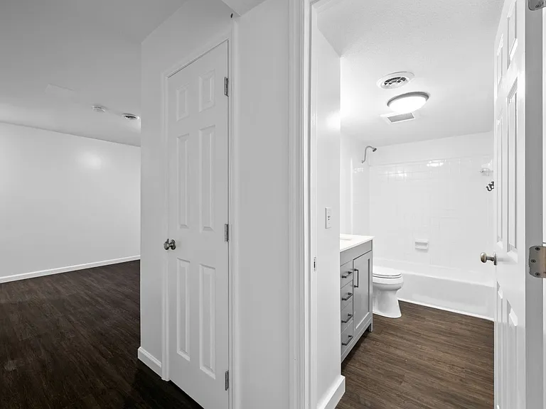 Downstairs Full bathroom with a tub shower combo.