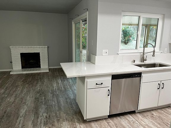 All new Quartz countertops, backsplash, cabinets, appliances, floors and windows