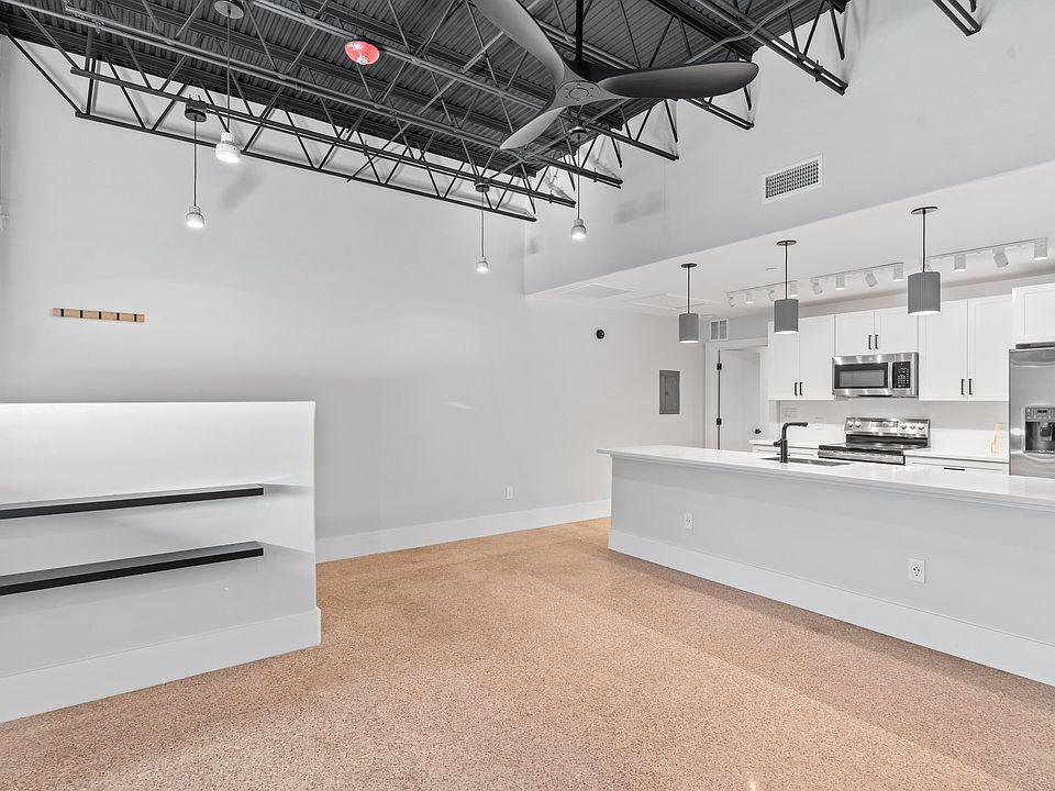 Ceiling fans provide a gentle breeze in the living room and bedroom.