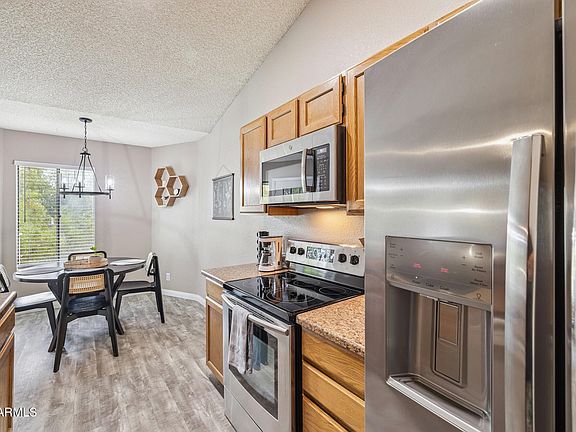 5th image of 5230 E BROWN Road #204