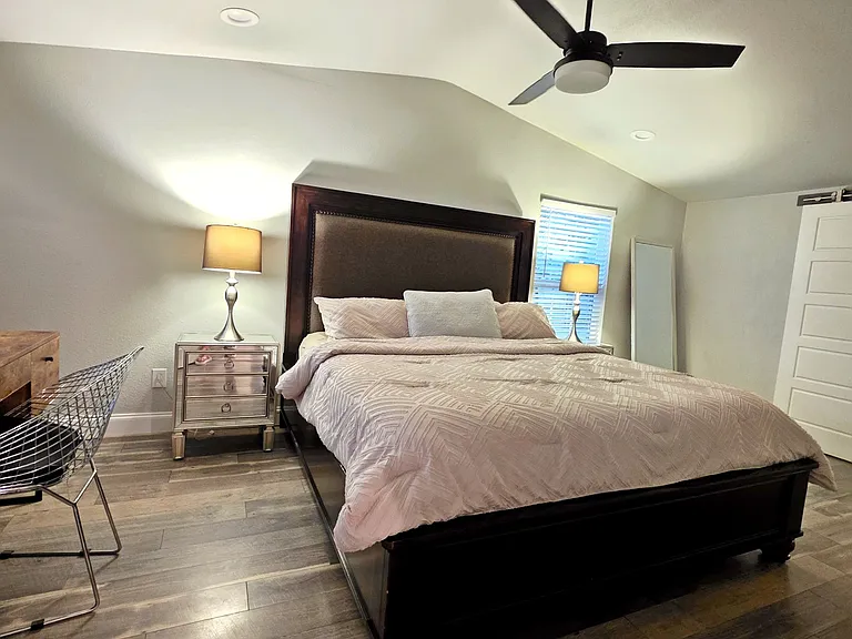 Beautiful, glass nightstands and premium lampshades upclass the Master, ready for your personalized touches.