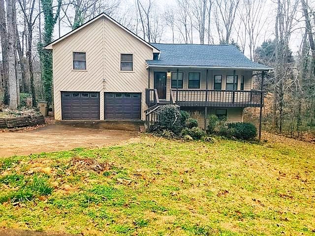 Two and half car garage, large front porch - new roof