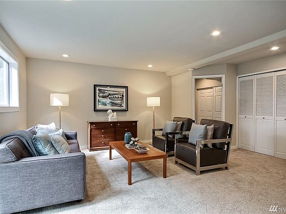 Lower level family room connecting to a main level JR Suite