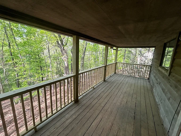 To the right, you see the long expanse of the back deck.