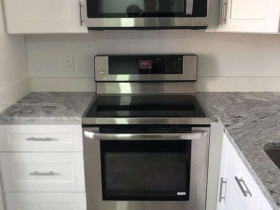 2nd image of 8550 N Sherman Cir APT 306
