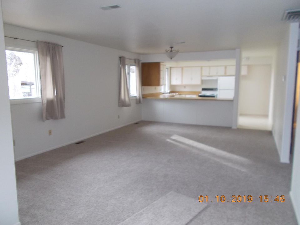 living room open to kitchen bar